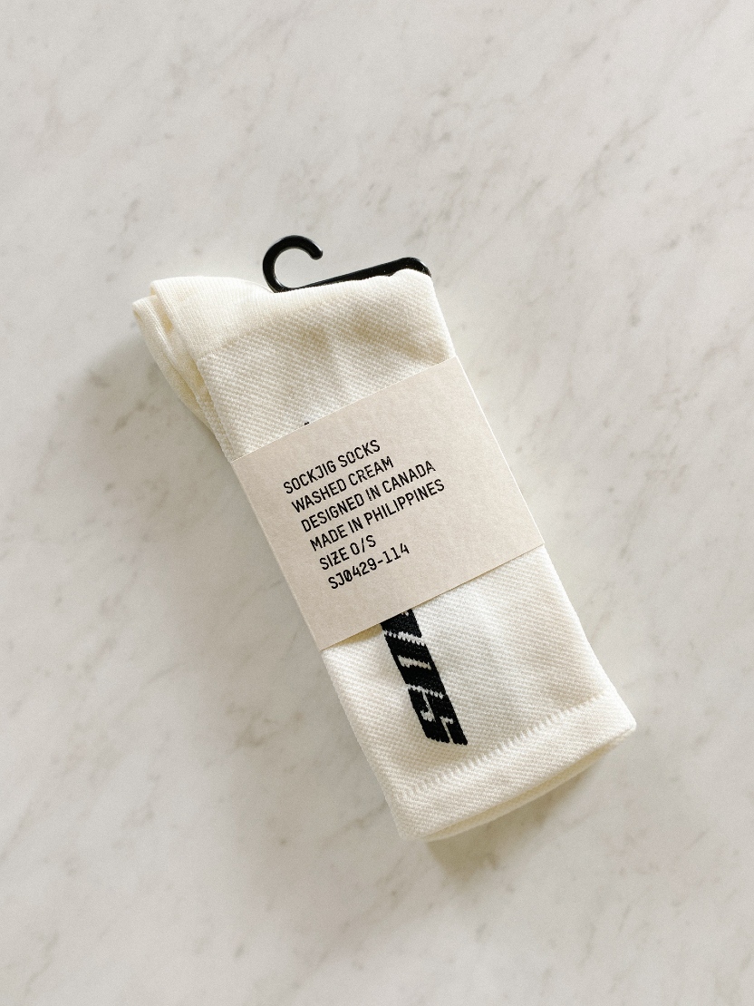 Sockjig Socks in packaging on slate counter